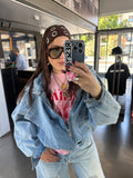 Chiodo over denim Carlita Blanco
