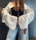Top con maxi manica