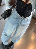 Jeans balloon strappo